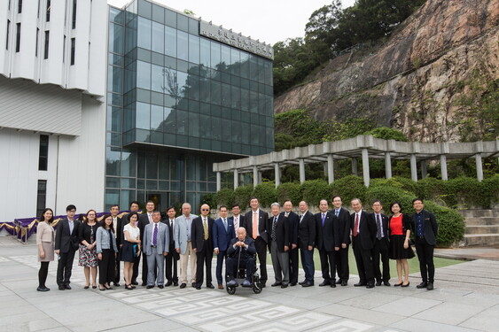 A group photo of guests taken in front of the Li Dak Sum Yip Yio Chin Building.