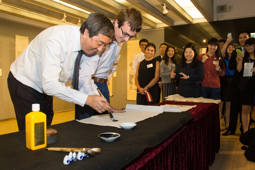 Prof. Sung demonstrates Chinese calligraphy.