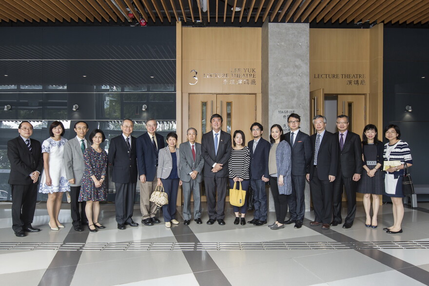 A group photo taken at the entrance of Lee Yuk Lecture Theatre
